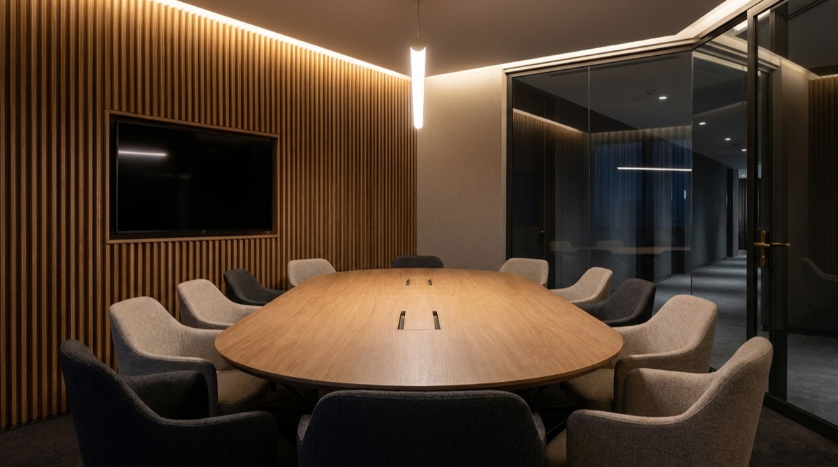 Meeting room with acoustic slat wall and flush display